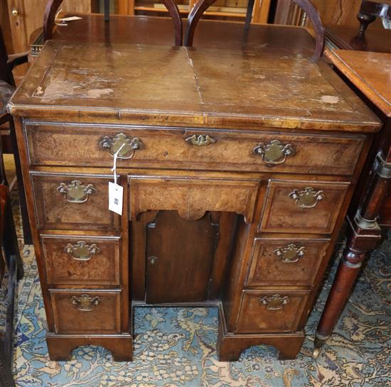 A George I style walnut kneehole desk, W.74cm, D.44cm, H.77cm